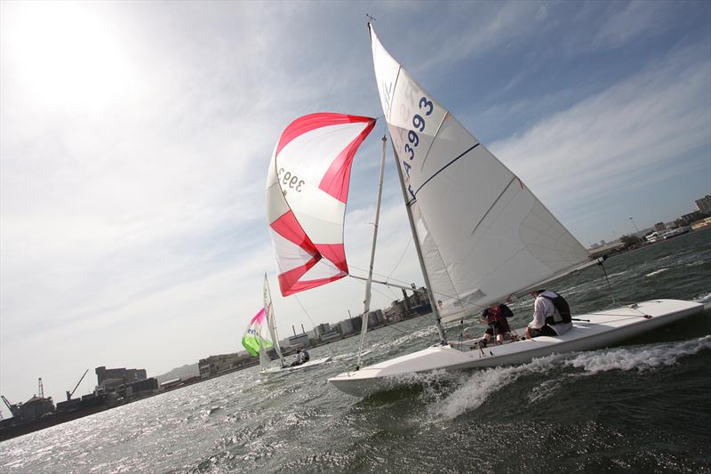 Campbell Alexander and Lorna Rae Daniel chase down Patrick Harris and Jeremy Kriek during day one of a previous Flying 15 Nationals held in Durban photo copyright Sophie Thompson taken at Aeolians Club and featuring the Flying Fifteen class