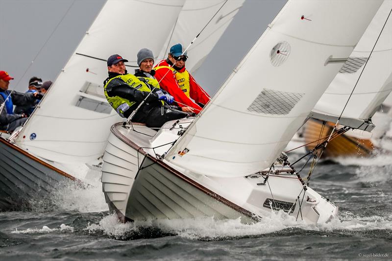 At Kiel Week 2018 in the yellow jersey of the leaders: German Folkboat Sports Director Sönke Durst at the helm, here with Marc Rokicki and Ulrich Schaefer crewing. - photo © Kieler Woche / ChristianBeeck.de