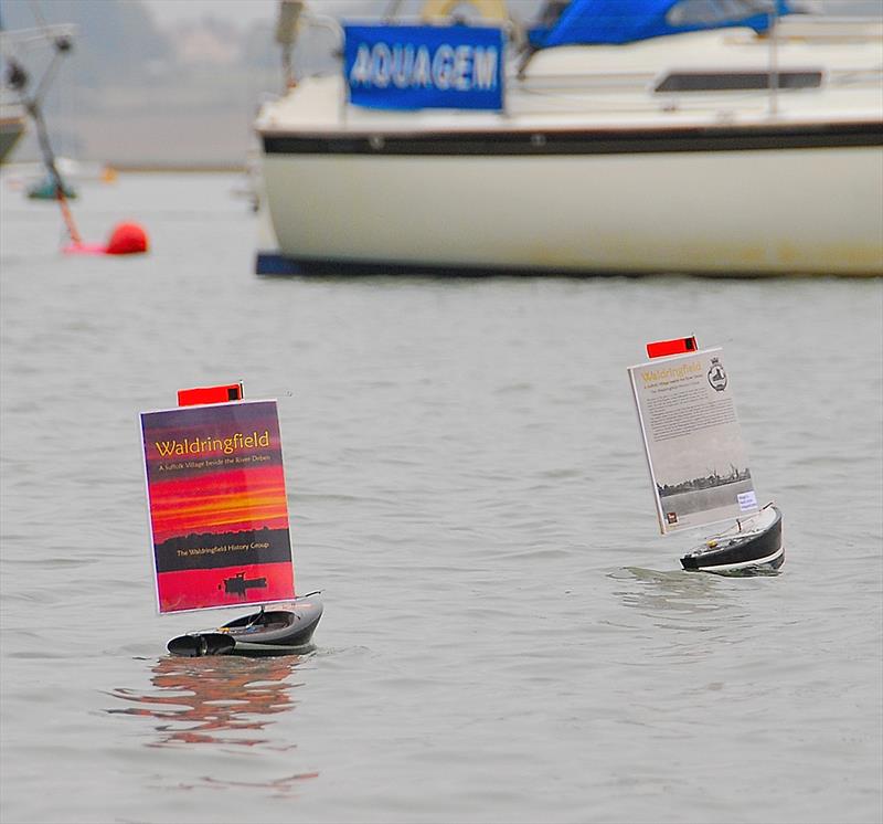 Footys help to launch a book photo copyright Roger Stollery taken at Waldringfield Sailing Club and featuring the Footy class