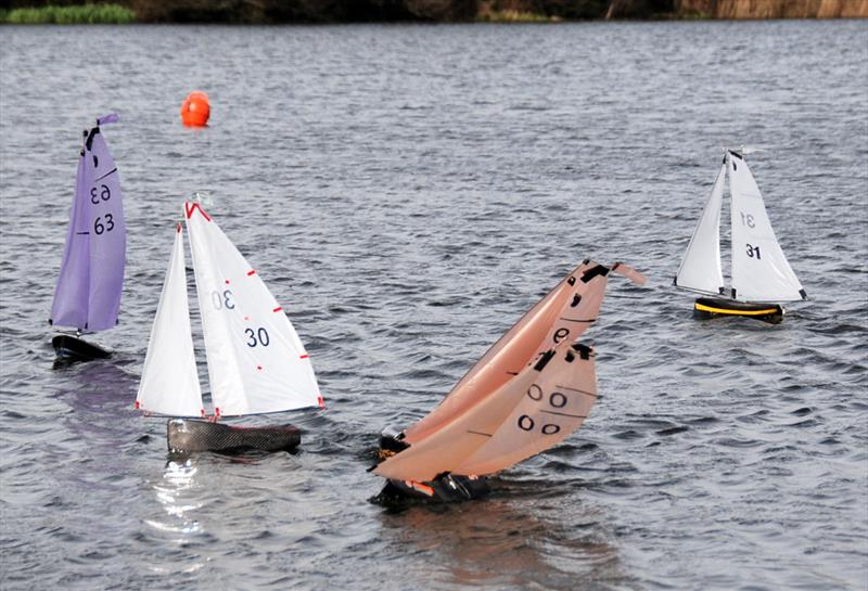 The close finish during the 2022 Footy Nationals & Videlo Globe at Frensham photo copyright Roger Stollery taken at Frensham Pond Sailing Club and featuring the Footy class