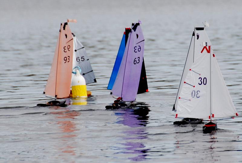 Peter Shepherd 65 leading the fleet at the leeward mark during the 2022 Footy Nationals & Videlo Globe at Frensham photo copyright Roger Stollery taken at Frensham Pond Sailing Club and featuring the Footy class