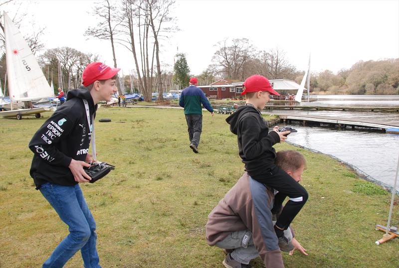 All Stollery eyes on a close finish on the line during the 2022 Footy Nationals & Videlo Globe at Frensham photo copyright Roger Stollery taken at Frensham Pond Sailing Club and featuring the Footy class