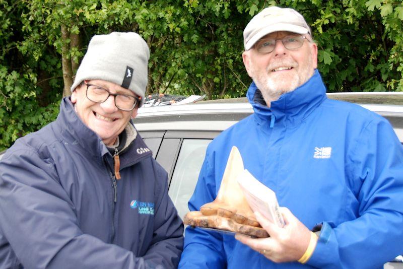 (L-R) RO Charles Wand-Tetley presents Peter Shepherd with Fred's Big Toephy and a prize photo copyright Keith Parrott taken at Guildford Model Yacht Club and featuring the Footy class
