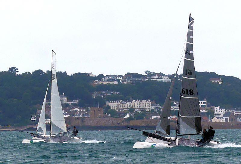 F18 Wildcats (L-R) Ansy Hart and Michael Kinross, Adrian Jesson and Steve Longstaffe in the Rossborough Round the Island Race photo copyright William Harris taken at Royal Channel Islands Yacht Club and featuring the Formula 18 class