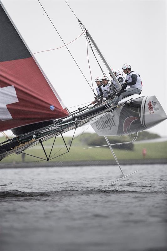 The Swiss team fly a hull on the final day of Extreme Sailing Series™ Act 3 in Cardiff Bay photo copyright Lloyd Images taken at  and featuring the GC32 class