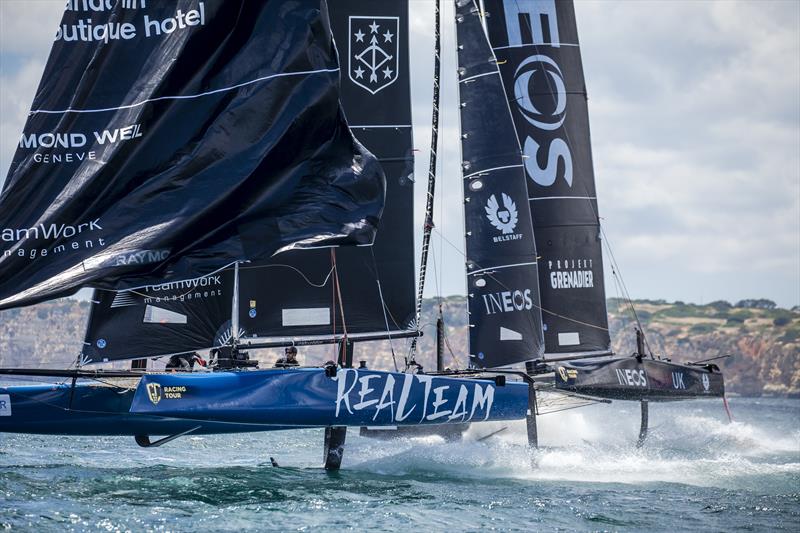 Realteam fends off an advancing INEOS TEAM UK on day 3 of the GC32 Lagos Cup 2018 photo copyright Jesus Renedo / GC32 Racing Tour taken at  and featuring the GC32 class