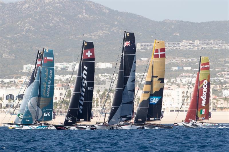 The Extreme Sailing Series 2017. Act 8. 30th November- 3rd December 2017. Los Cabos Mexico, Cabo San Lucas Resort. Pictures of the fleet of race yachts crossing the start line on day 1 of racing close to Los Cabos - photo © Lloyd Images