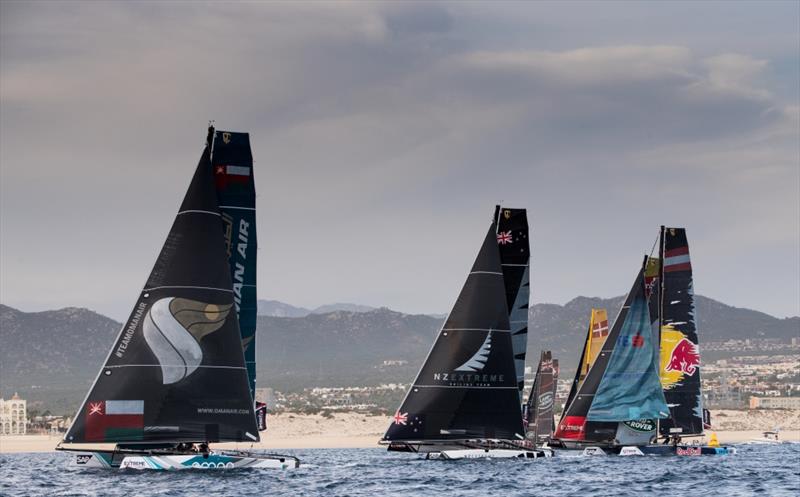 The Extreme Sailing Series 2017. Act 8. 30th November- 3rd December 2017. Los Cabos Mexico, Cabo San Lucas Resort. Pictures of the fleet of race yachts crossing the start line on day 2 of racing close to Los Cabos - photo © Lloyd Images