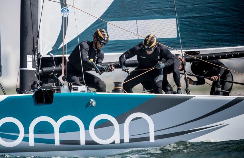 Extreme Sailing Series day 2 of racing close to the shore and city of Muscat, Oman photo copyright Lloyd Images taken at Oman Sail and featuring the GC32 class