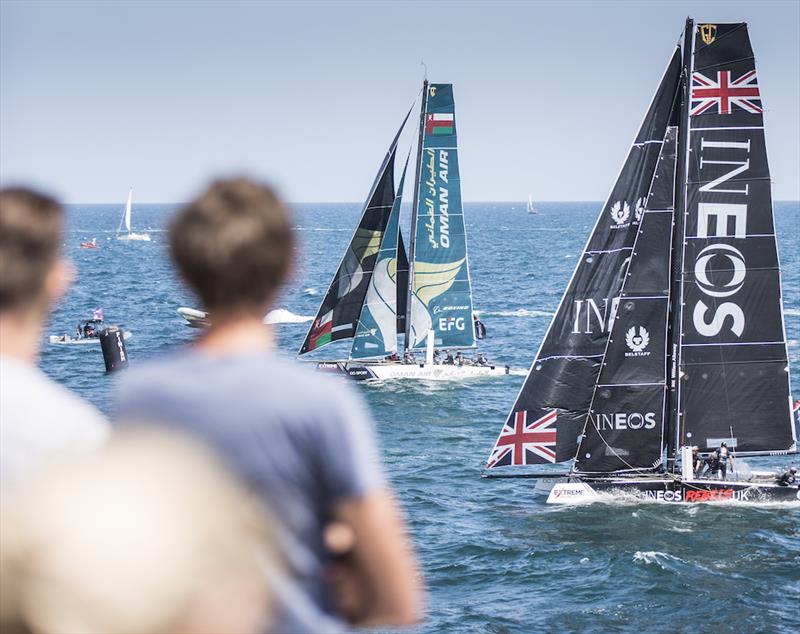 Fleet close to the city on day 1 of Extreme Sailing Series Act 3, Barcelona photo copyright Lloyd Images taken at  and featuring the GC32 class