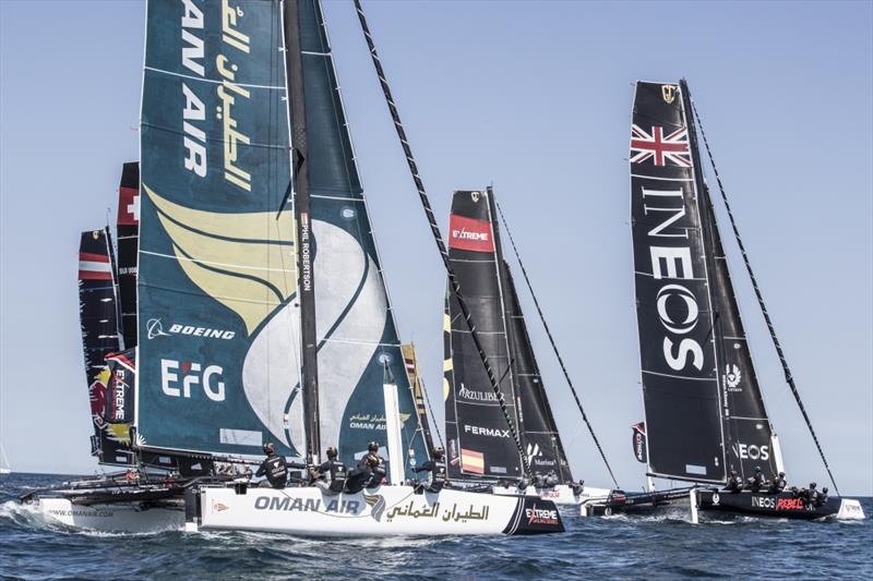 The Extreme Sailing Series . Act 3. 14th-17th June. Barcelona, Catalonia, Spain. The fleet of race yachts in action during day 3 of racing close to the city photo copyright Lloyd Images taken at  and featuring the GC32 class