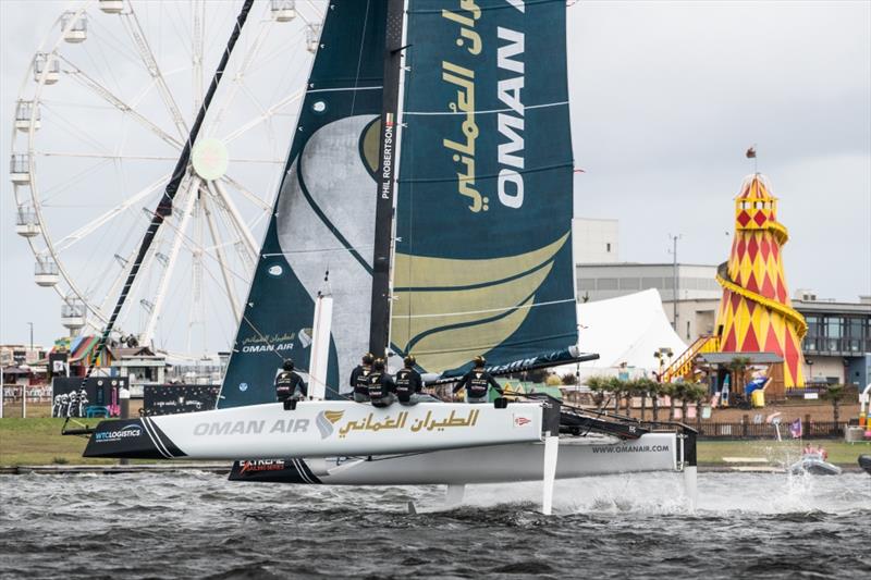 The 'Oman Air' race team shown in action close to the shore - Extreme Sailing Series™ Cardiff 2018 photo copyright Vincent Curutchet / Lloyd Images taken at  and featuring the GC32 class