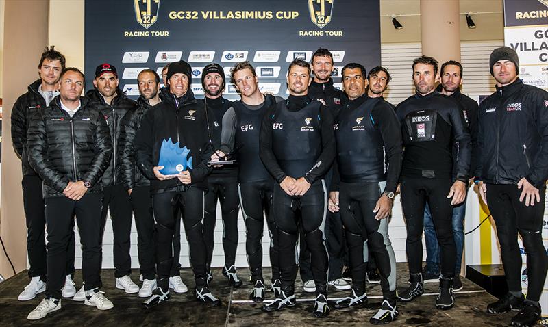 The GC32 Villasimius Cup podium - first Oman Air, second Alinghi and third INEOS Rebels UK  photo copyright Sailing Energy / GC32 Racing Tour taken at  and featuring the GC32 class