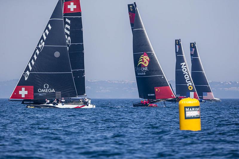 Alinghi does the 'wild thing' downwind in a light patch today photo copyright Jesus Renedo / Sailing Energy / GC32 Racing Tour taken at  and featuring the GC32 class