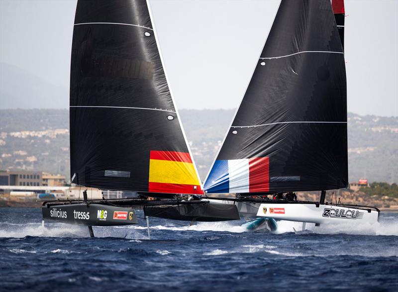 The Iker Martinez-steered M&G Tressis Silicius crosses ahead of Erik Maris' Zoulou. - 38 Copa del Rey MAPFRE photo copyright Sailing Energy / GC32 Racing Tour taken at Real Club Náutico de Palma and featuring the GC32 class