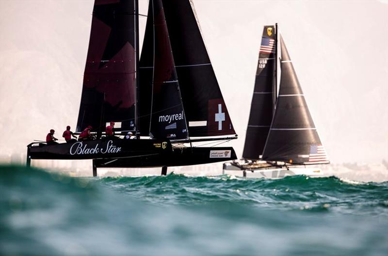 Christian Zuerrer's Black Star Sailing Team jockey with Jason Carroll's Argo - 2019 GC32 Oman Cup day 2 - photo © Sailing Energy / GC32 Racing Tour