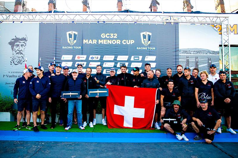 The 2021 GC32 Racing Tour podium - Alinghi plus the Red Bull and Black Star Sailing Teams - 2021 GC32 Mar Menor Cup photo copyright Sailing Energy / GC32 Racing Tour taken at  and featuring the GC32 class