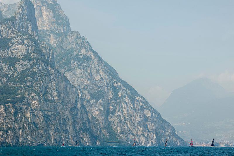 The stunning background never fails to impress at the northern end of Lake Garda - day 2 of the GC32 Riva Cup photo copyright Sailing Energy / GC32 Racing Tour taken at Fraglia Vela Riva and featuring the GC32 class