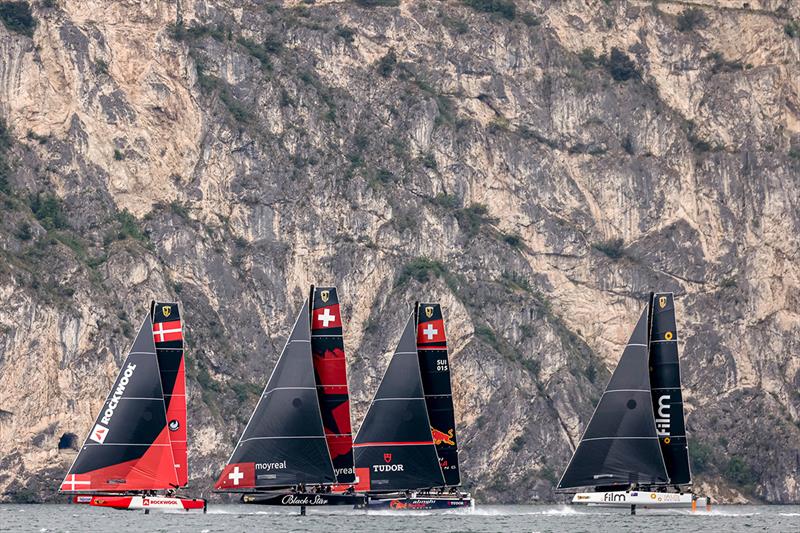 GC32s hug the Lake Garda cliff face - GC32 Riva Cup 2022 photo copyright Sailing Energy / GC32 Racing Tour taken at Fraglia Vela Riva and featuring the GC32 class