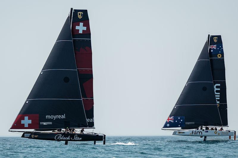 Black Star Sailing Team and .film AUS Racing slog it out at the GC32 Lagos Cup 2023 photo copyright GC32 Racing Tour / Tó Mané taken at  and featuring the GC32 class