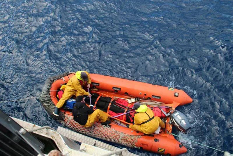 Abhilash Tomy is taken from Thuriya to the French rescue vessel - photo © French Fisheries Protection