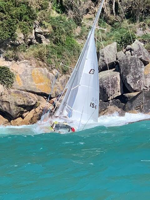 Dreamcatcher stuck hard against the cliff in Abel Tasman National Park - photo © Michael Davey