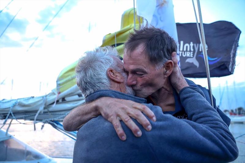 Jean Luc VDH, winner of the 2018 Golden Globe in 212 days, welcomes Tapio Lehtinen back to Les Sables d'Olonne , the final finisher after 322 days at sea photo copyright Jf.Brossier / Ville des Sables d’Olonne taken at  and featuring the Golden Globe Race class