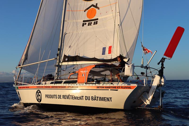 Damien Guillou arriving at the photogate Lanzarote in 12th position - photo © Nora Havel / GGR2022