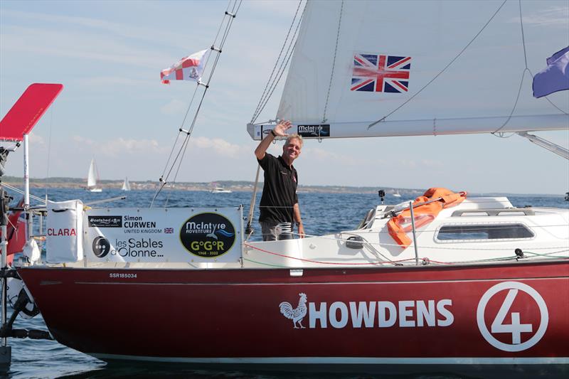 129 days ago Les Sables d'Olonne, Simon Curwen (GBR) on HOWDENS at the startline photo copyright GGR2022 / Etienne Messikommer taken at  and featuring the Golden Globe Race class