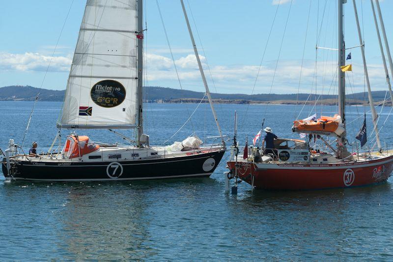 Jeremy Bagshaw sails past Ian Herbert Jones whilst still at anchor, to say goodbye - Golden Globe Race (January 2023) - photo © Jackie Zanetti / Alex Papij (Rusalka) / GGR2022