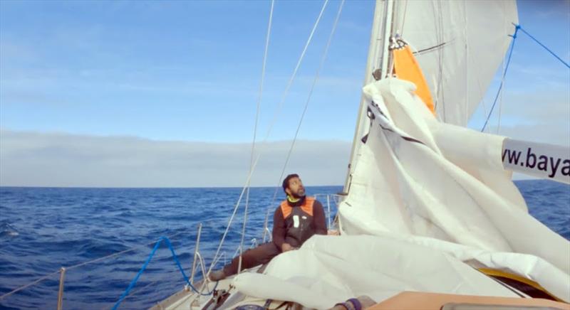 Abhilash has been challenged with ongoing repairs aboard Bayanat, including stitching a four metre rip in his mainsail - photo © Abhilash Tomy / GGR