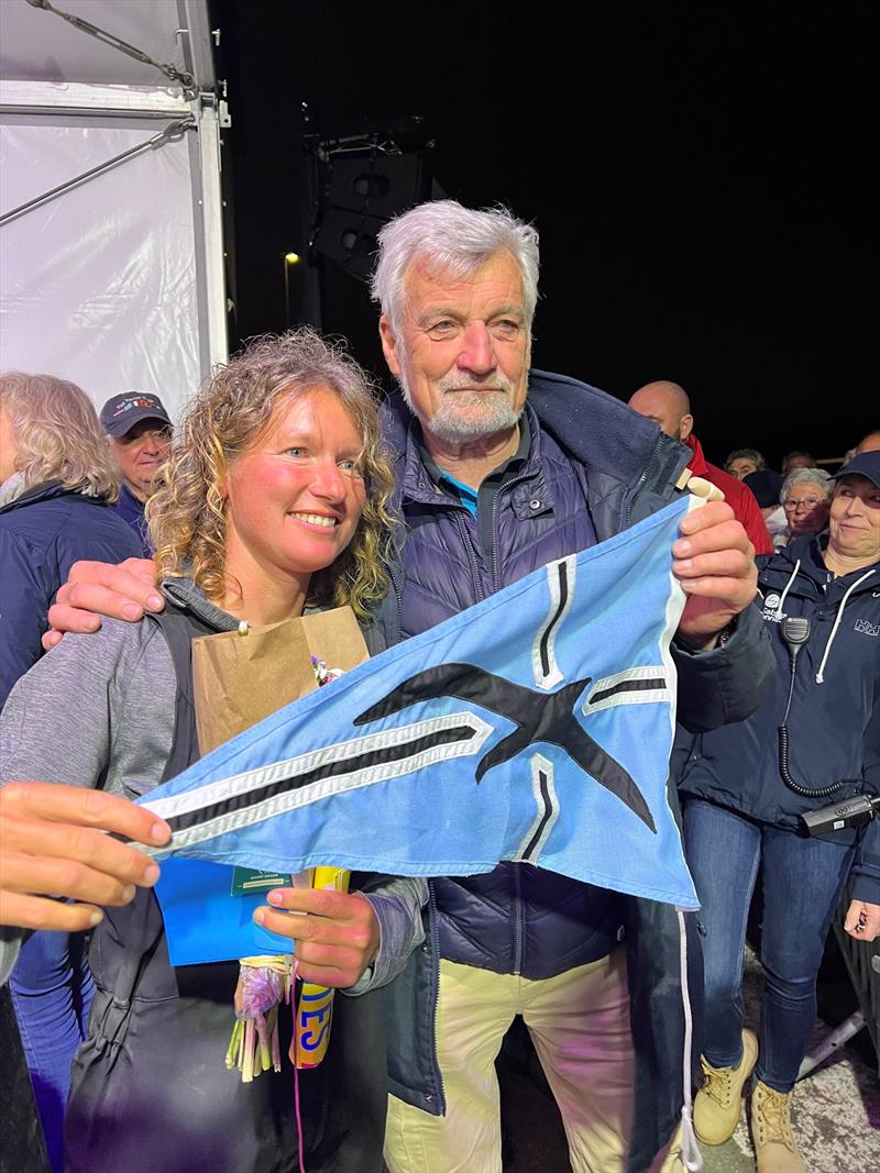 South African yachtswoman Kirsten Neuschäfer, winner of the 2022/3 Golden Globe Race, receiving her Cape Horners burgee from Jean-Luc Van Den Heede, a past winner of the GGR, and Vice President of the International Association of Cape Horners  photo copyright Aida Valceanu / GGR / PPL taken at  and featuring the Golden Globe Race class