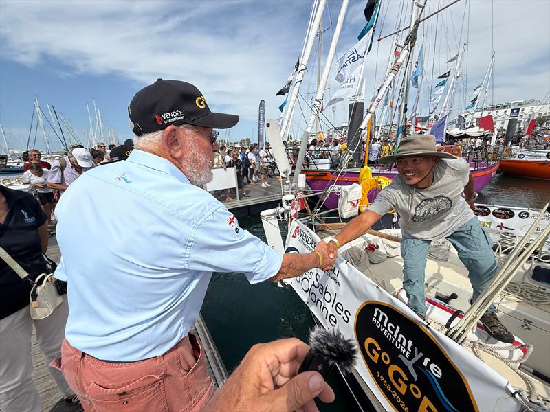 A handshake carrying nearly six decades of Golden Globe history. Sir Robin Knox-Johnston, the only finisher of the original 1968-69 Sunday Times Golden Globe, gives one of the GGR2026 skippers a final handshake and a few words of encouragement before leav - photo © Don McIntyre / GGR