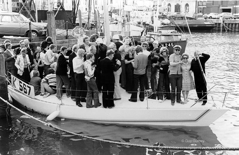 A ‘two boats' in one picture moment, captured by Guy Gurney. Bob was at Weymouth racing his Soling, but using his Half-Tonner as a base camp. - photo © Guy Gurney