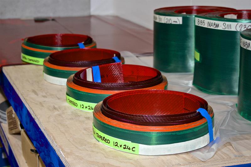 Hall Spars - Cut pre-preg ready to go on the wooden former, each battens is uniquely designed - photo © Richard Gladwell