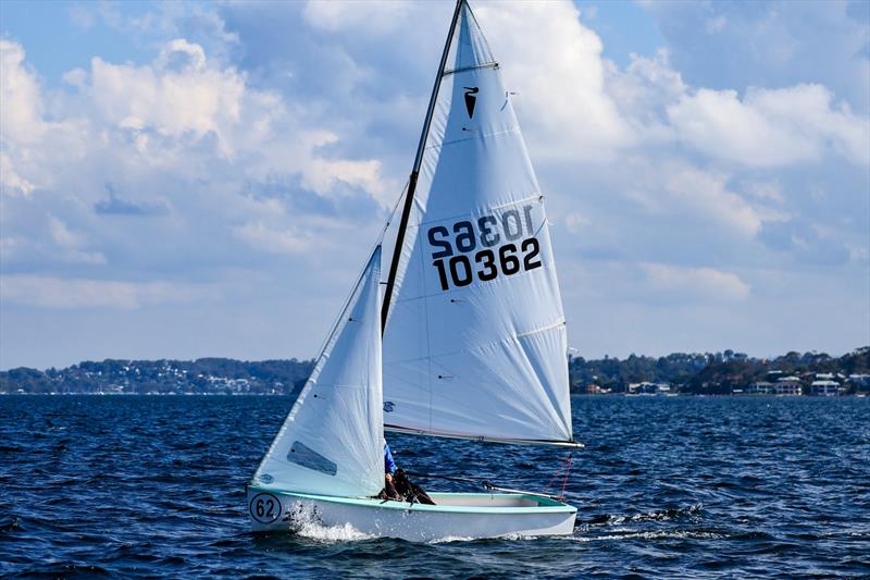 Archer Sacre third in R2 on Zhik Combined High Schools (CHS) Sailing Championships Day 1 photo copyright Red Hot Shotz Sports Photography / Chris Munro taken at Belmont 16ft Sailing Club and featuring the Heron class