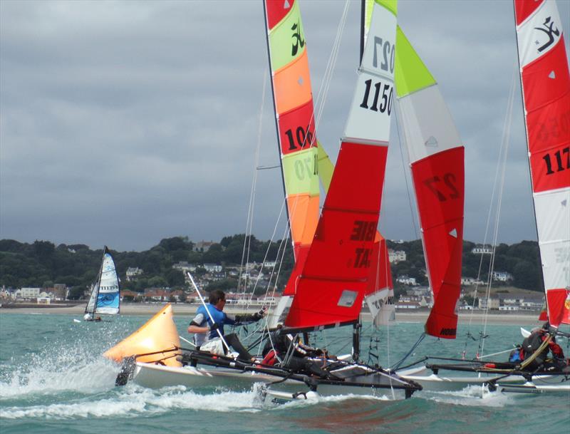 Hobie 16s at the downwind gate during the Rubicon (Jersey) Channel Islands Hobie Cat Championships photo copyright Bill Harris taken at Royal Channel Islands Yacht Club and featuring the Hobie 16 class