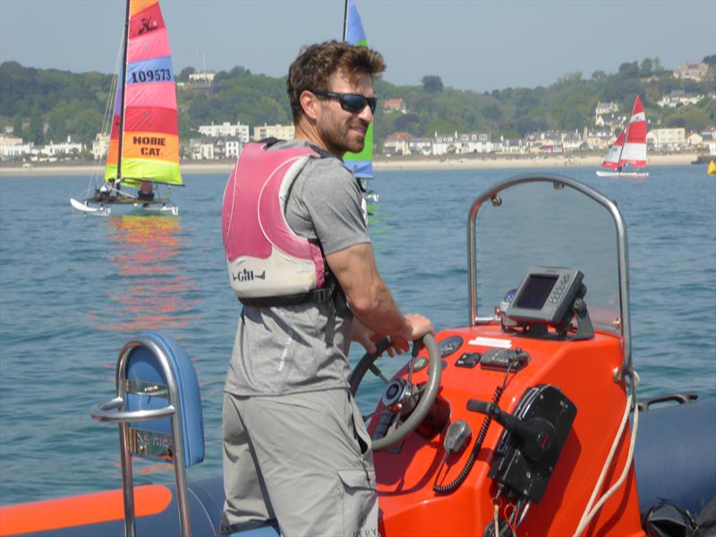 Phil Sharp gives the fleet some racing tips during the RCIYC Hobie Fleets Rosscot Spring Series photo copyright Elaine Burgis taken at Royal Channel Islands Yacht Club and featuring the Hobie 16 class