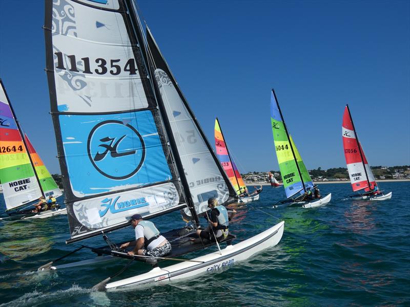 Love Wine 'Summer Breeze' Series in Jersey photo copyright Elaine Burgis taken at Royal Channel Islands Yacht Club and featuring the Hobie 16 class