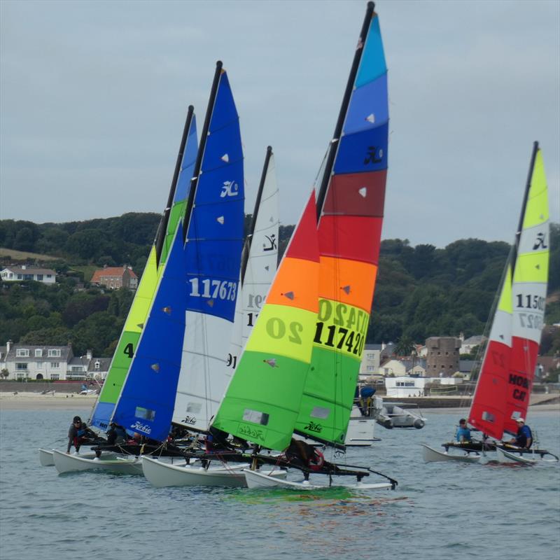 Class 6 - Hobie 16s start at the Carey Olsen Jersey Regatta 2021 photo copyright Elaine Burgis taken at Royal Channel Islands Yacht Club and featuring the Hobie 16 class