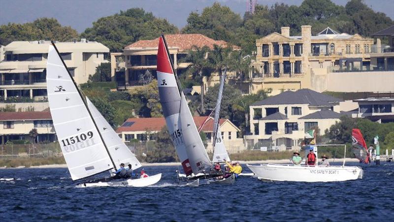 Close racing, Epps just crosses Owen-Ghent to take the win in the final race - Hobie 16 State Championships 2019 photo copyright Lindsay Preece / Ironbark Photos taken at Nedlands Yacht Club and featuring the Hobie 16 class