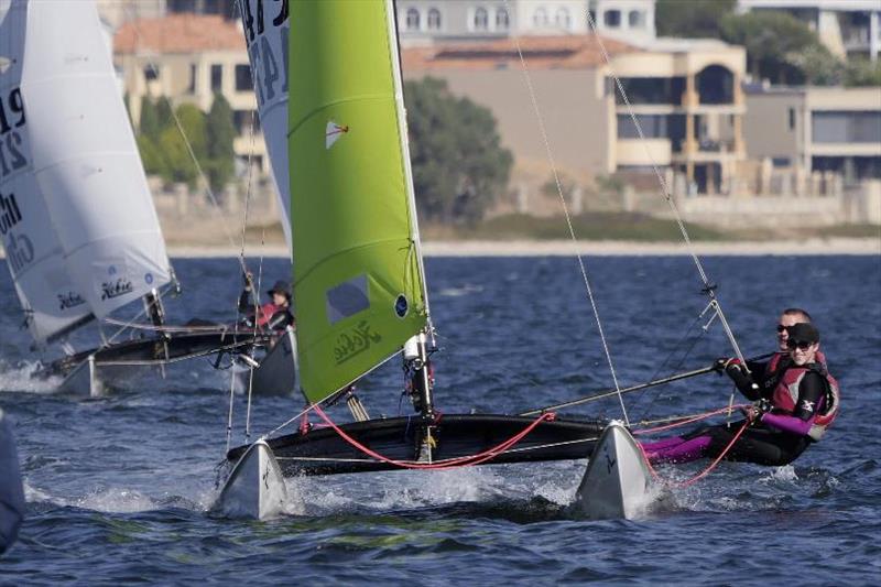 Peter and Samantha enjoying the reach back to the shore - Hobie 16 State Championships 2019 photo copyright Lindsay Preece / Ironbark Photos taken at Nedlands Yacht Club and featuring the Hobie 16 class