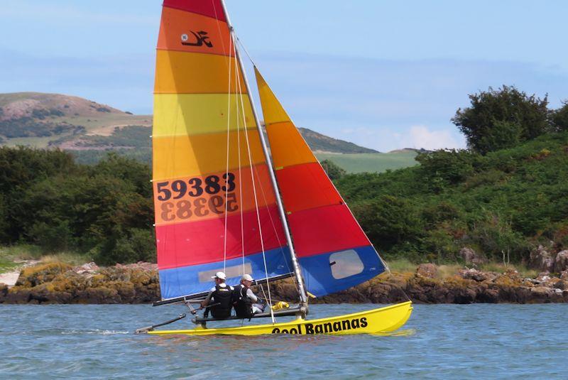Colourful “Cool Bananas” Ben Ibbotson and Emma James enjoying a great sail - Kippford Week at Solway photo copyright John Sproat taken at Solway Yacht Club and featuring the Hobie 16 class