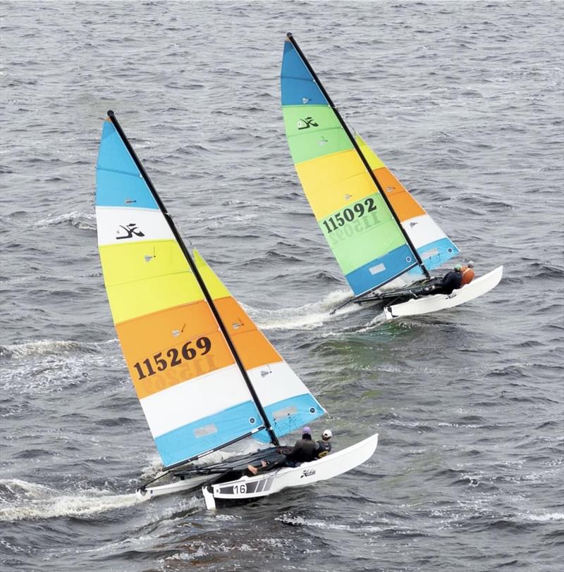 Hobie 16's Darren chasing Jess - photo © SailsOnSwan