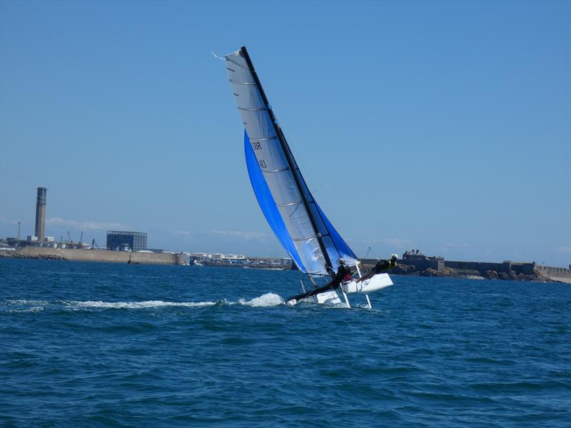 Darren Stower and Julian Adamson's Hobie Wildcat during the Love Wine 'Summer Breeze' Series in Jersey - photo © Elaine Burgis