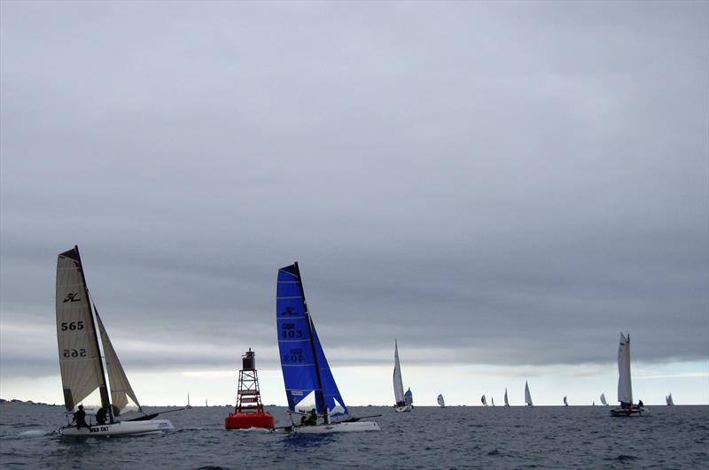 Hobie 565 and Smurf at the Diamond buoy, Violet Channel buoy bound during the Rossborough Round the Island Race 2020 photo copyright Andy Broadhurst taken at Royal Channel Islands Yacht Club and featuring the Hobie Wild Cat class