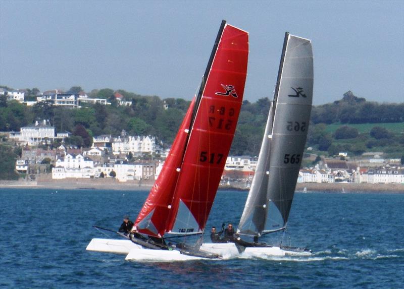 RCIYC Spring Regatta - Sunday - Wildcats 517 and 565 finishing R3 photo copyright William Harris taken at Royal Channel Islands Yacht Club and featuring the Hobie Wild Cat class