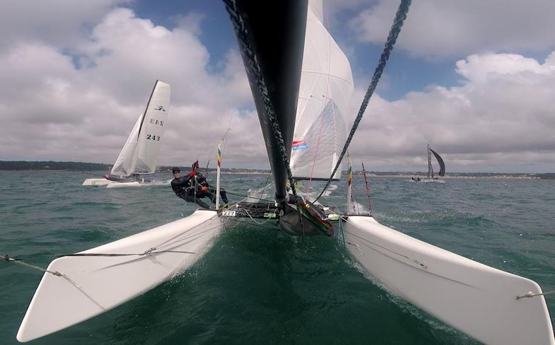 Andy Hart and Rob McAllister in the Estimating Services Minquiers Cat Dash photo copyright Jack Clayden taken at Royal Channel Islands Yacht Club and featuring the Hobie Wild Cat class