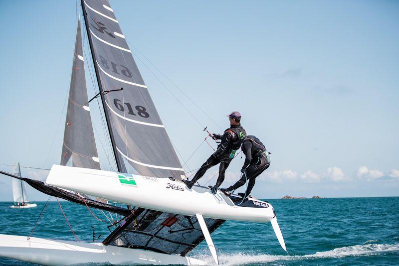 Hobie Wildcat winners, Adrian Jesson and Paul Martin, in the Estimating Services Minquiers Cat Dash photo copyright Jack Clayden taken at Royal Channel Islands Yacht Club and featuring the Hobie Wild Cat class