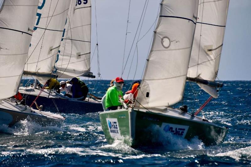 Fast-paced sailing action in the STSC's Mid-Winter Clinic & Regatta in Paradise photo copyright Dean Barnes taken at St. Thomas Yacht Club and featuring the IC24 class